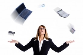 business woman juggling too much work
