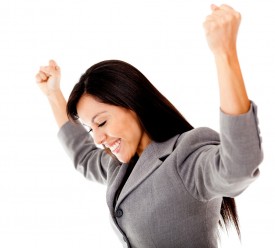 successful business woman arms up