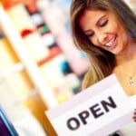 business woman retail open sign