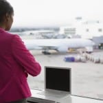 african american woman business trip travel airport