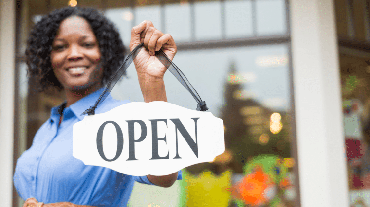 woman business open sign