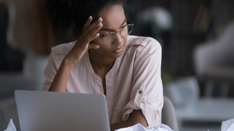 unhappy woman at job