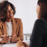 Professional woman discussing career advancement strategies with her manager