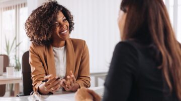 Professional woman discussing career advancement strategies with her manager