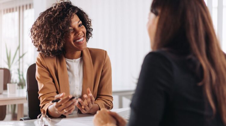 Professional woman discussing career advancement strategies with her manager