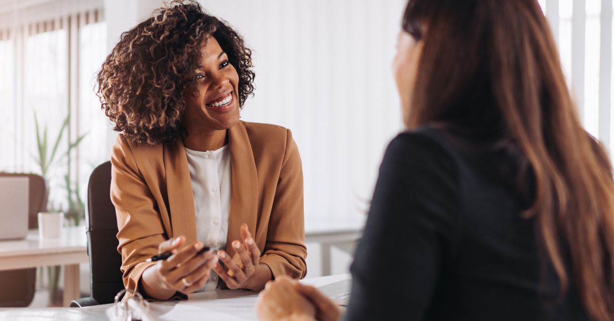 Professional woman discussing career advancement strategies with her manager