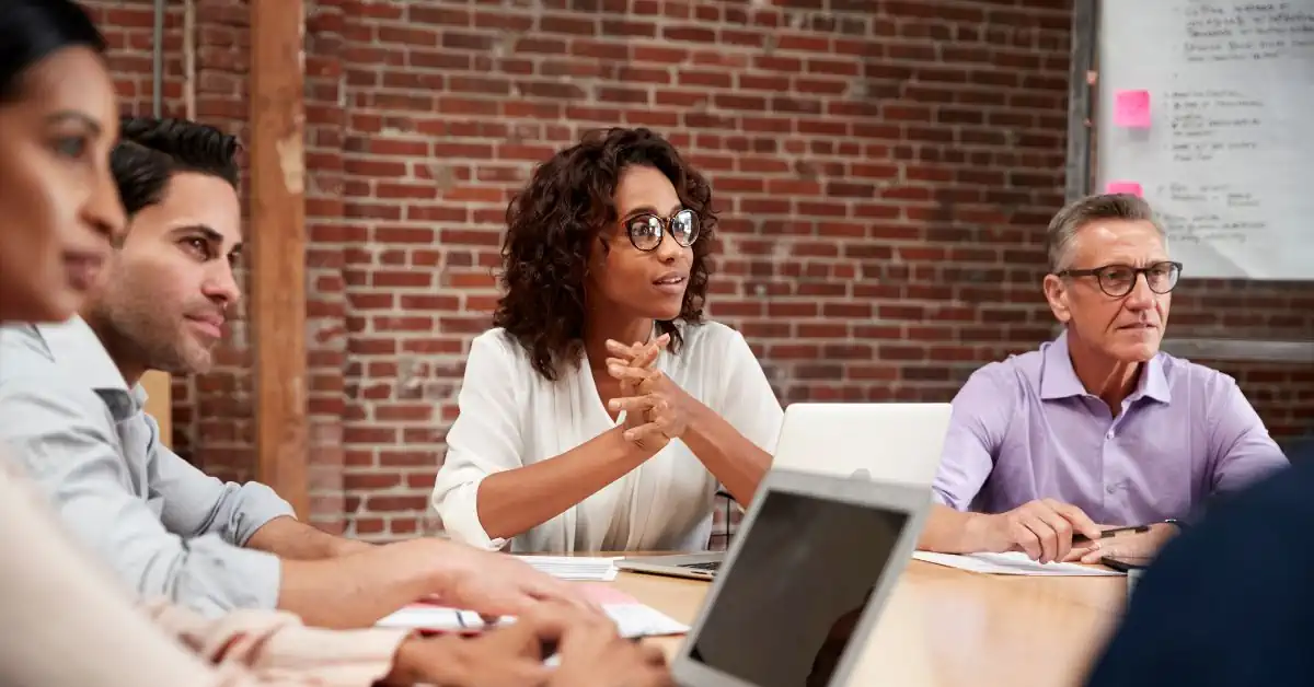 Comparison of the characteristics of a manager and a leader including organization, influence, performance, and employee development