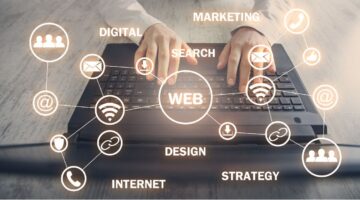 keyboard hands typing with web development and marketing icons