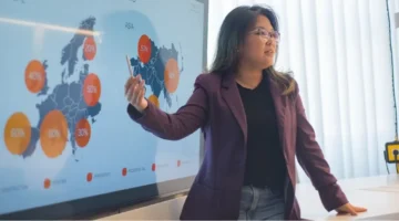 businesswoman at map discussion market expansion opportunities