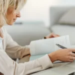 woman online school book and laptop