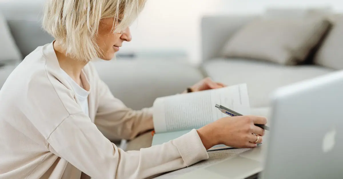 woman online school book and laptop